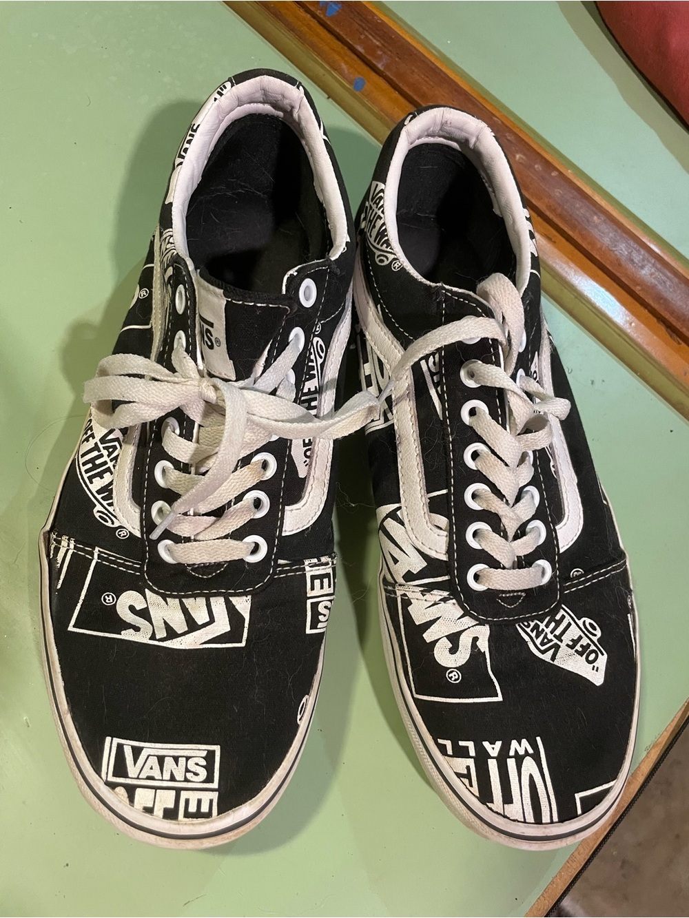 Vans Black & White Logo Pattern Low-Top Sneakers